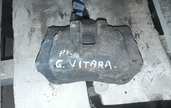 Suzuki Grand Vitara II Front brake caliper NOCODE