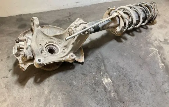 Volkswagen PASSAT B7 Front wheel hub spindle knuckle