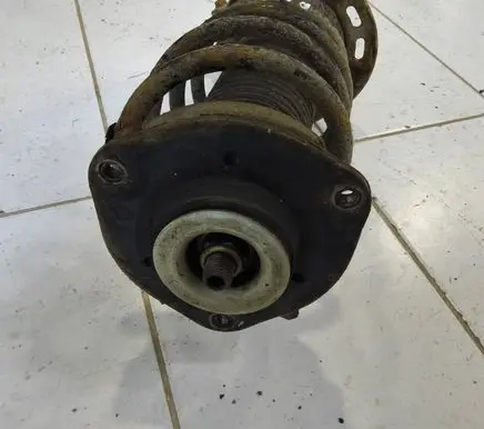 Volkswagen PASSAT B6 Front shock absorber with coil spring