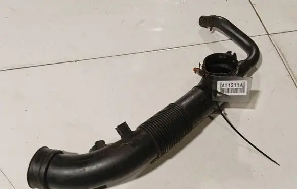 Opel Corsa D Air intake hose/pipe 55557181