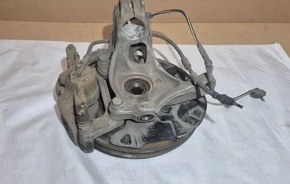Skoda Octavia Mk3 (5E) Front wheel hub spindle knuckle 5Q0407258A