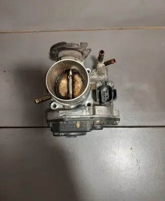 Volkswagen Golf IV Throttle valve 06A133064M 408237111015