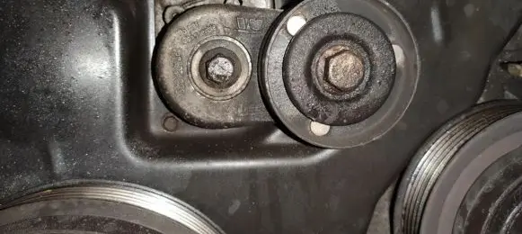 Chrysler Voyager Generator/alternator belt tensioner 35612018F