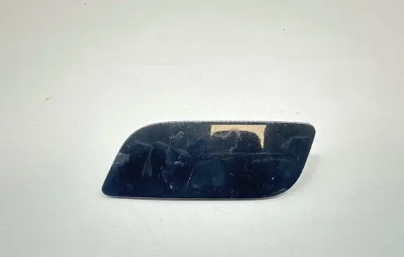 Headlight washer spray nozzle cap/cover