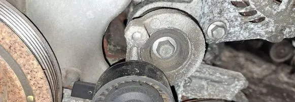 Generator/alternator belt tensioner