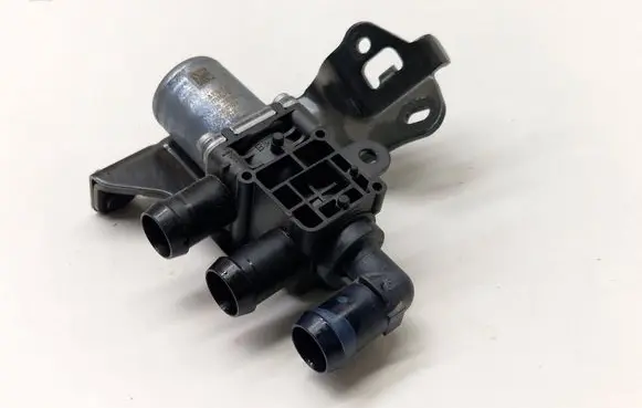 Coolant heater control valve