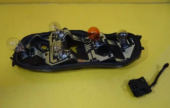 Opel Corsa D Tail light bulb cover holder 89037853