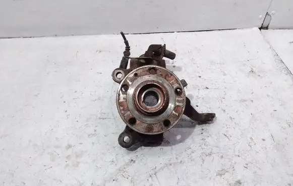 Volkswagen Touran I Front wheel hub spindle knuckle 1K05N