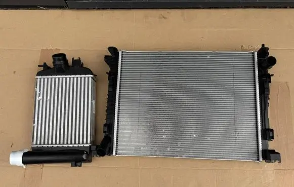 Dacia Sandero III Coolant radiator 214107347R 921005FA0A 144961019R