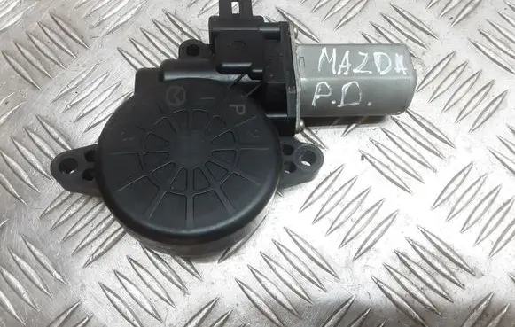Mazda 323 Front door window regulator motor CM012030