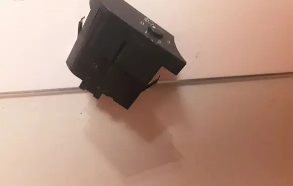 Headlight level height control switch