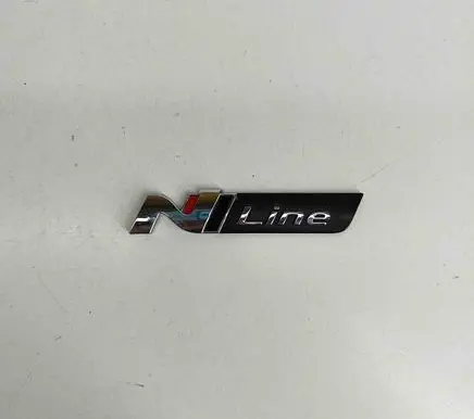 Hyundai Tucson IV NX4 Fender model badge letters 86318N9000