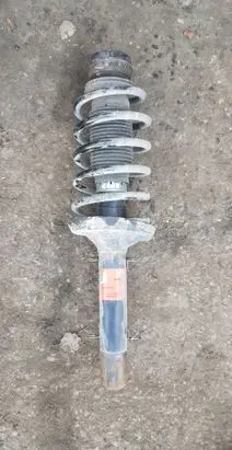 Volkswagen Golf IV Front shock absorber with coil spring 