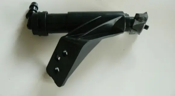 Hyundai Santa Fe Headlight washer spray nozzle 986712W000