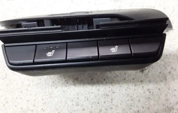 Seat heating switch