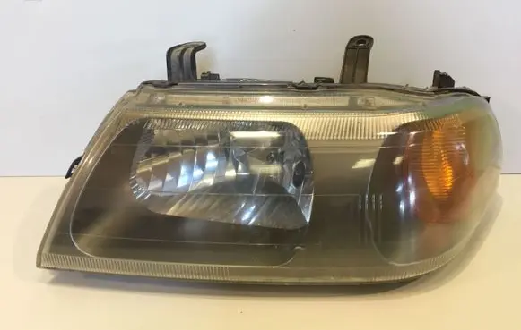 Mitsubishi Pajero Sport I Headlight/headlamp 10087415