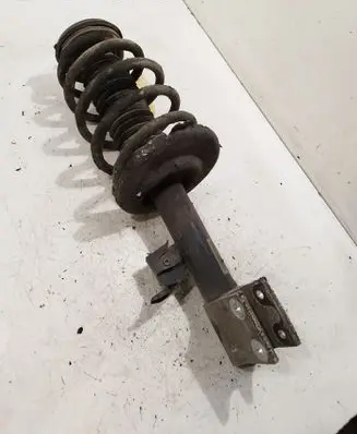 Peugeot Partner Front shock absorber with coil spring