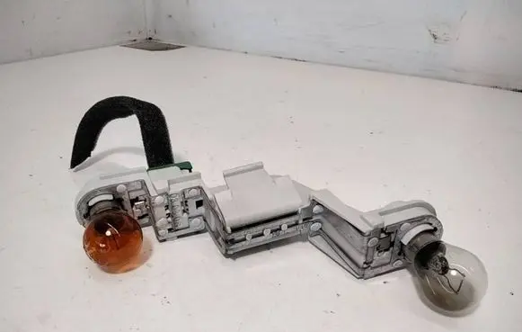 Volvo V50 Tail light bulb cover holder 28127002