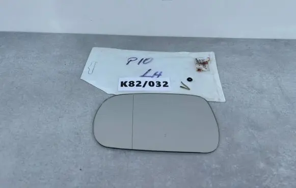 Nissan Primera Wing mirror glass 2728541E
