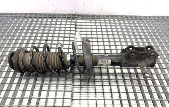 Opel Astra J Front shock absorber/damper 13474015
