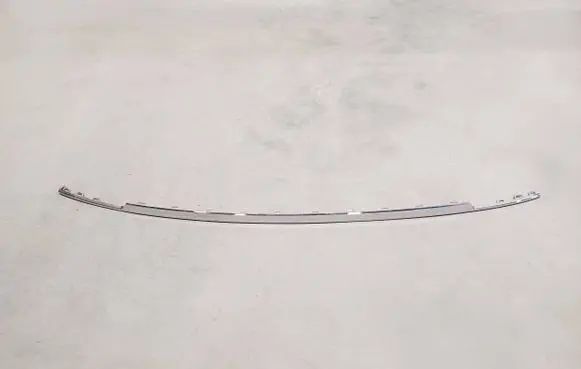 Rear bumper trim bar molding