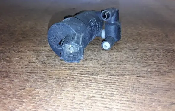 Ford Focus Windscreen/windshield washer pump 1S7117K624FE