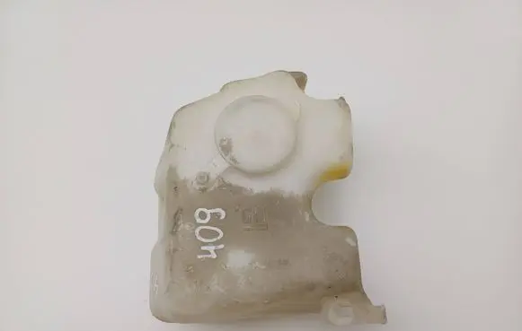 Opel Astra F Windshield washer fluid reservoir/tank 0023935