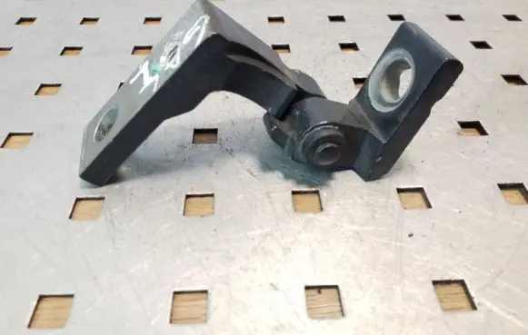 Rear door upper hinge