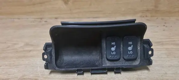 Seat heating switch