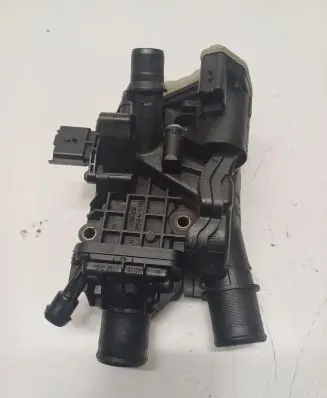Thermostat/thermostat housing