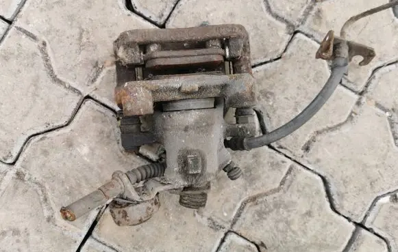 Opel Zafira A Rear brake caliper TH802M27 C4H11658