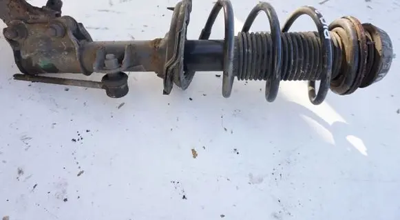 KIA Rio Front shock absorber with coil spring MCPERSON