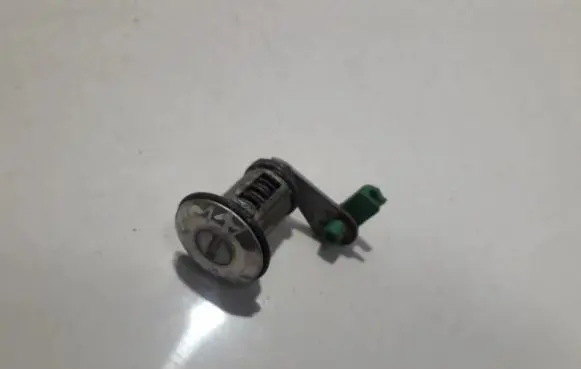 Nissan Almera Front door lock (next to the handle) 