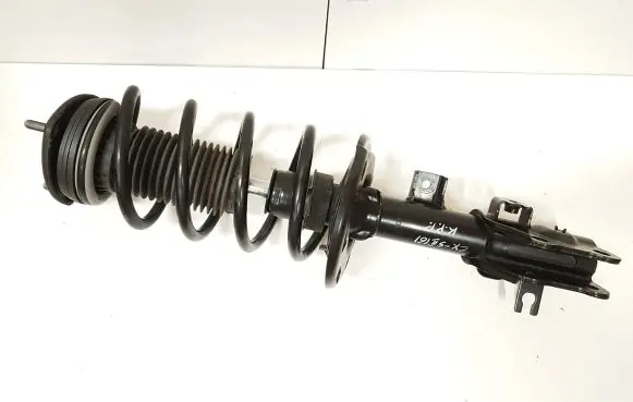 Front shock absorber with coil spring