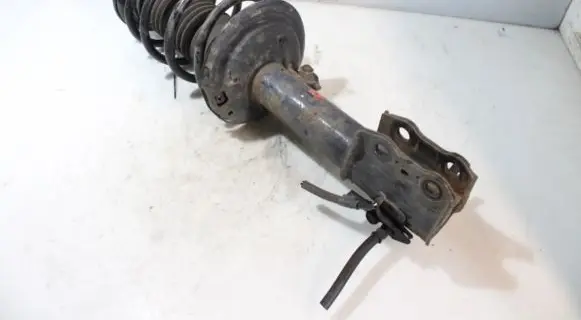 Front shock absorber with coil spring