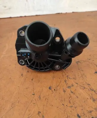Thermostat/thermostat housing