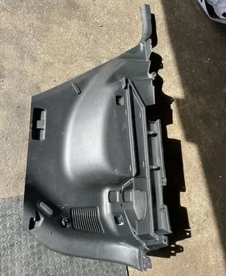 Trunk/boot lower side trim panel
