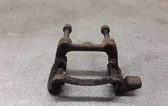 Volkswagen Touran I Brake caliper pad carrier rear 