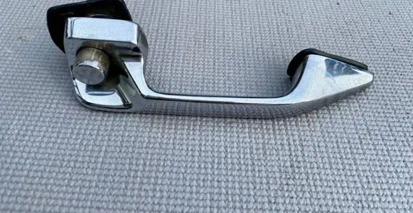 Mercedes-Benz COMPAKT W115 Rear door interior handle 1157660105