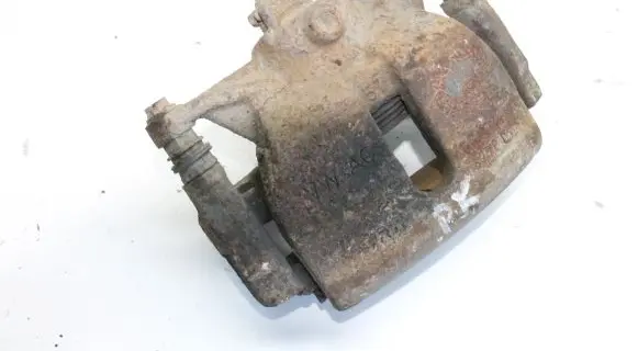 Volkswagen Golf VII Front brake caliper