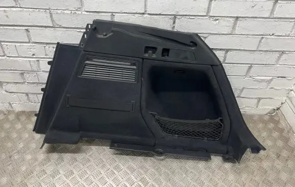 Trunk/boot lower side trim panel