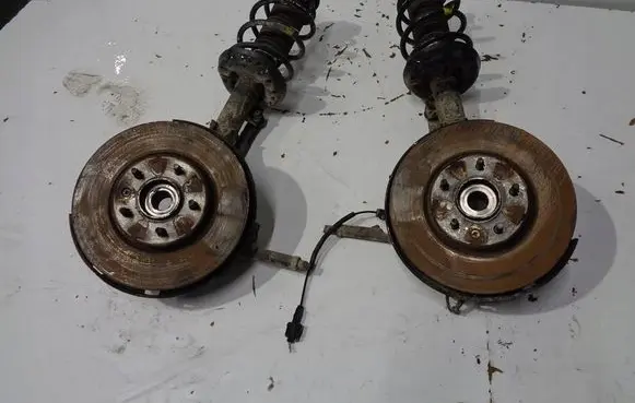 Front wheel hub spindle knuckle
