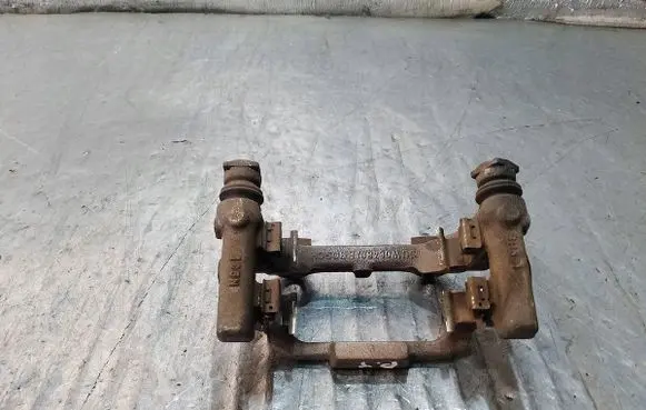 Volkswagen Jetta VI Brake caliper pad carrier rear 