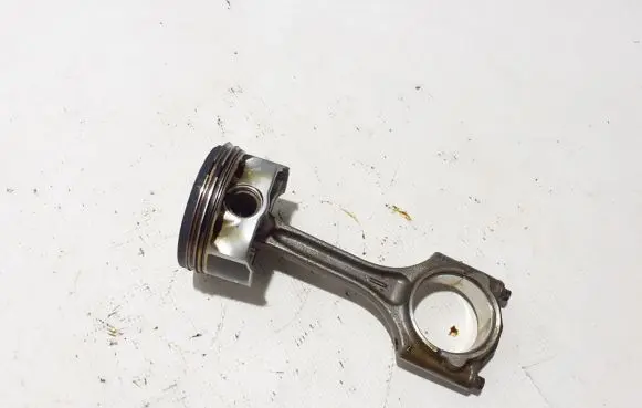 Piston with connecting rod