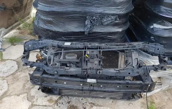 Radiator support slam panel