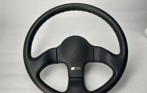 Mitsubishi Eclipse (D21A/D22A/D27A) Steering wheel Mb564477