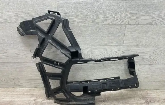 Front bumper mounting bracket