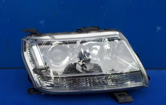 Suzuki Grand Vitara II Headlight/headlamp 10059079