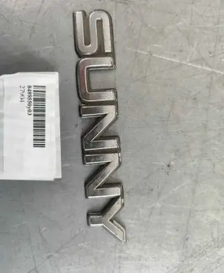 Nissan Sunny Manufacturer badge logo/emblem 8489550Y03