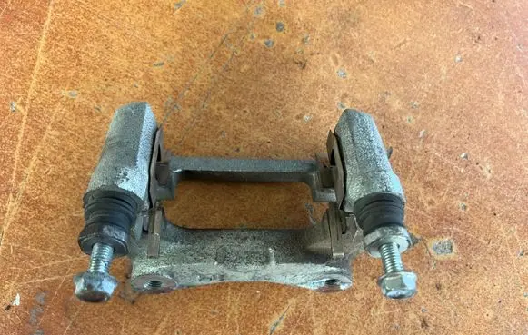 Mazda CX-3 Brake caliper pad carrier rear 